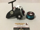 DAM Quick 330N fishing reel w/ tackle, approx 6 x 6 x 5 in.