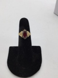 Women's 10k gold 1 1/2k approx Ruby ring with accents size 7. 2.4g
