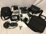Lot of modern cameras, bags, accessories; Sony Handycam HDR-XR160, Panasonic LUMIX TZ5, Yashica 35mm