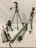 Lot of tri-pod camera stands, and handheld camera stands; Velbon, Slik, see pics.