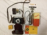 Vintage M&F 35mm film camera made in West Germany w/ leather case/strap, attachments. Sold as is.