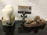 2 pc. lot of Alaskan sculpture art; Earthquake Clay seal Hunter in canoe, polar bear on marble base