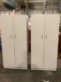 Pair of white painted steel storage cabinets, shows wear, approx 30 x 16 x 64 in.
