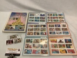 The Disney Classic Fairytales in US Postage Stamps book w/ 6 sealed stamp sets/1 open.