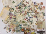 Stamp collection. Many...styles of postmarked stamps