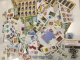 Stamp collection. Many different styles of postmarked stamps