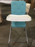 Vintage childrens high chair, blue vinyl, metal frame, plastic tray, approx 23 x 19 x 36 in.