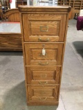 Vintage wood 4-drawer file cabinet w/ folders, 2 locking drawers, 1 key, approx 19 x 28 x 54 in.