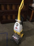 Bissell Powersteamer Deluxe carpet cleaner , tested/working, approx 12 x 18 x 46 in.