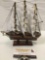 Small wooden cloth sail ship model, nice condition, approx 8 x 8 x 2 in.