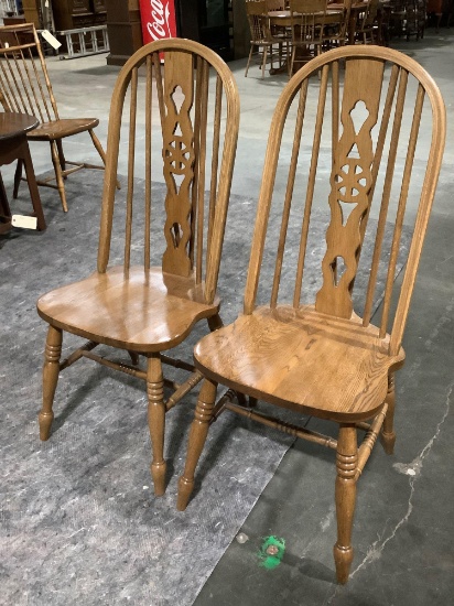 2 pc. A America solid oak Windsor chairs, approx. 18 x 19 x 42 in.