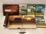 Lot of John Deere DVDs and VHS.