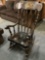 Nichols and Stone Co. wood rocking chair w/ painted details, approx 25 x 33 in.