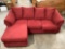 Ashley Furniture Red couch with lounge seat, approx 84 x 32 x 64 in. Shows wear, see pics.