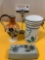 3 pc. lot of ceramic home decor; kitchen jar, oil pitcher, butter dish lid. Approx 5 x 7 in.