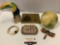 6 pc. lot of mixed collectibles/ decor: Evergreen candle, wood toucan, brass art, bone bracelet