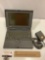 Apple Macintosh power book 180 with cord and power book video cable, untested, sold as is.