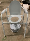 Drive portable toilet chair w/ receptacle, lid, approx 21 x 20 x 23 in.