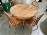 Wooden dining table with glass top cover, 4 wooden chairs, 1 made in Japan, approx 42 x 31 in.