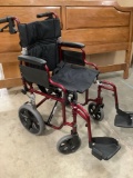 Nova wheelchair w/ foot rests and hand brakes, nice condition, approx. 20 x 40 x 38 in.