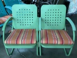 2 pc. lot of green painted metal patio furniture, 2 chairs w/ cushions.