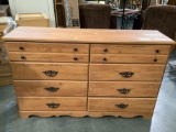 Wood 8 drawer lowboy dresser, shows wear, approx 61 x 37 x 17 in.