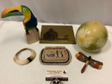 6 pc. lot of mixed collectibles/ decor: Evergreen candle, wood toucan, brass art, bone bracelet