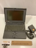 Apple Macintosh power book 180 with cord and power book video cable, untested, sold as is.