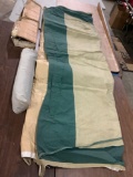 Lot of 2 vintage tents. Large canvas w/ steel poles. Smaller nylon tent in bag w/ poles. All sold as