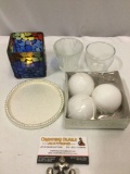 Lot of glass candleholders and ball candles, flat round metal candle holder.