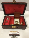 Vintage jewelry box with earrings, ring, bracelet and heart shaped pin.