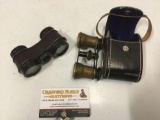 2 pc. lot of vintage small binoculars, 1 w/ case, shows wear, approx 4 x 2.5 x 1.5 in.