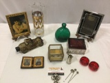 Nice lot of mixed vintage home decor: glass jewelry boxes, fondue forks, glass bottles, and more.