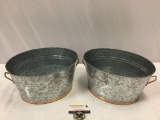 2 pc. lot of steel with copper handle buckets, approx 14 x 7 x 9 in.