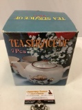 Vintage seven pc. tea service set in original box, approximately 7 x 7 x 8 in.