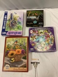 4 pc. lot of bird puzzles: Cobble Hill, Springbok, Hummingbirds and more. Sold as is.