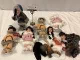 Lot of Spirit of Alaska porcelain girl dolls with outfits, 2 are damaged, see pics.