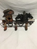 Collection of cowboy themed decorative items / bookends / coat rack/ boot bird house