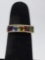 Size 7 women?s 10k gold ring laden with multiple gems