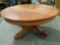 Vintage round wood coffee table, approx 42 x 19 in.