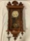Antique Junghans wood case wall clock w/ pendulum/ key, approx 14 x 30 x 6 in. Nice piece.