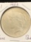 Peace Dollar 1923 BU coin.