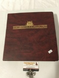 The Heritage Collection binder full of vintage postage stamps w/ COA.