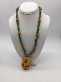 Very unique 20 inch turquoise necklace with Hand carved bone pendant w/ unique.925 clasp