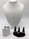 Nice selection of sterling silver jewelry 4 rings 1 necklace, and a pair of earrings