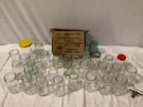 44 pc. lot of Ball/ Kerr canning jars: widemouth mason, self sealing, perfect mason, and more.