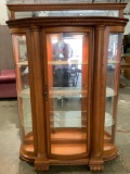 Pulaski Furniture Corp. curved glass lighted display cabinet, tested/working, nice condition.