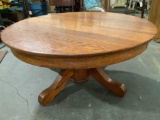 Vintage round wood coffee table, approx 42 x 19 in.