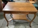 Vintage tiger oak wood table with one drawer, approx 38 x 26 x 30 in.