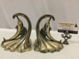 Antique 1937 DODGE metal marlin in wave bookends, approx 5 x 6 x 5 in.